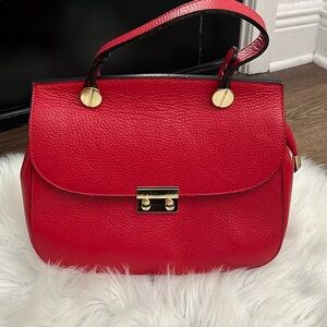 Really, pretty bag! Nice pebble leather. Great shape. Very little use.